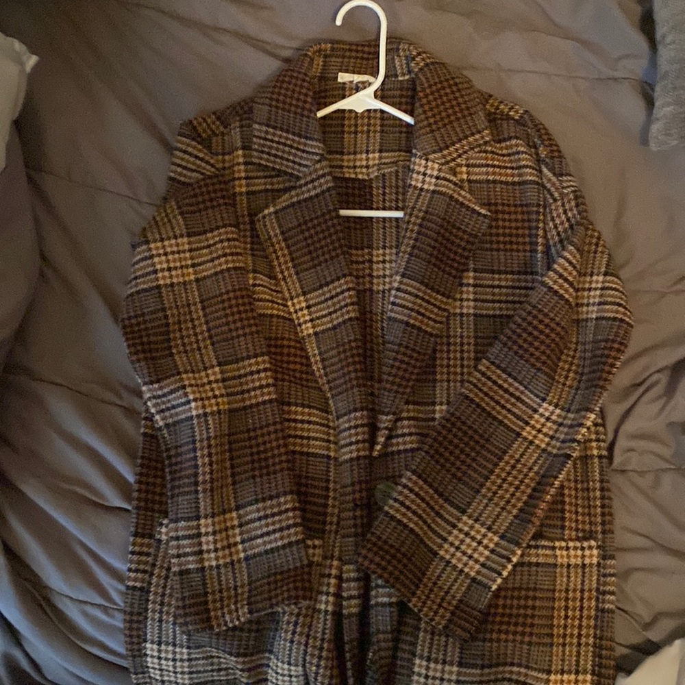 A small polyester coat very warm